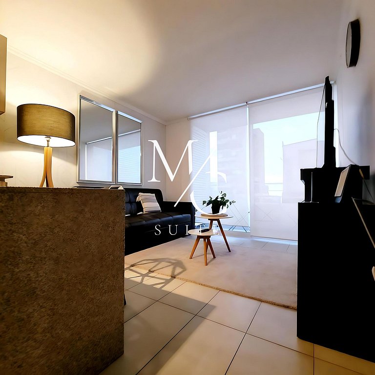 Moderno departamento central con estacionamiento