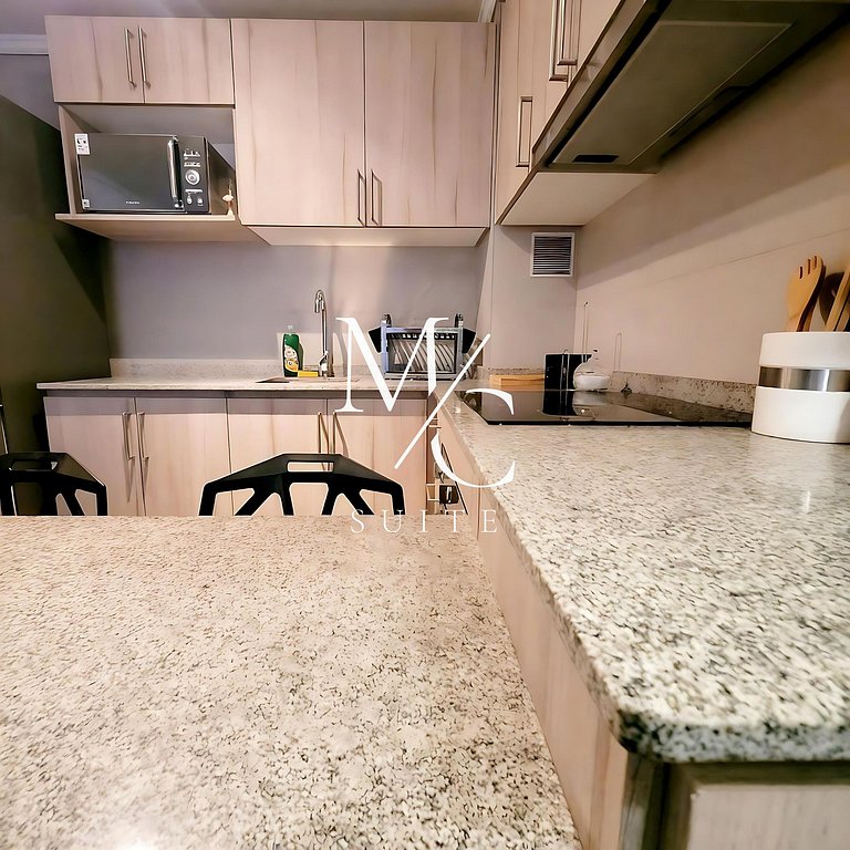 Moderno departamento central con estacionamiento